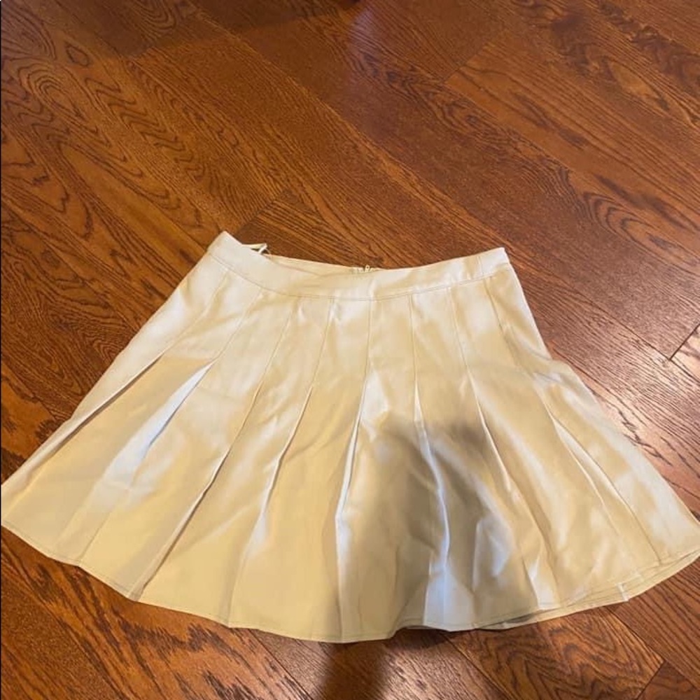 Pleated yellow skirt